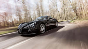 Stunning Alfa Romeo 8c Competizione In Motion Wallpaper