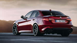 Stunning Alfa Romeo Giulia In Action Wallpaper