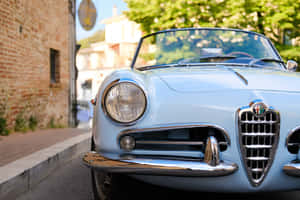 Stunning Alfa Romeo Spider In Action Wallpaper