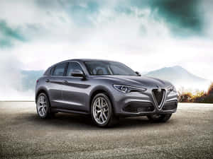 Stunning Alfa Romeo Stelvio In The Wilderness Wallpaper