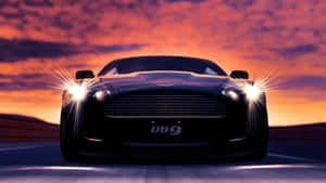 Stunning Aston Martin Db9 On The Road Wallpaper