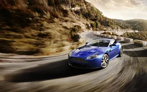 Stunning Aston Martin V12 Vantage In Motion Wallpaper