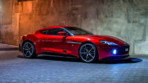 Stunning Aston Martin Vanquish In Vibrant Red Wallpaper