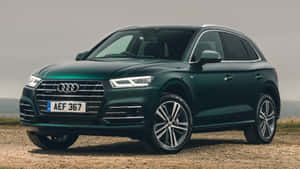 Stunning Audi Q5 Driving Through The City Wallpaper