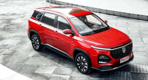 Stunning Baojun Car Cruising On The Highway Wallpaper