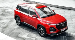 Stunning Baojun Car Cruising On The Highway Wallpaper