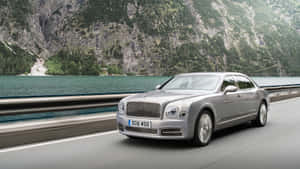 Stunning Bentley Mulsanne Cruising Down The Road Wallpaper