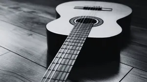 Stunning Black And White Guitar In Close-up View Wallpaper