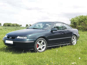 Stunning Blue Opel Calibra In Its Prime Wallpaper