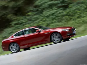 Stunning Bmw 6 Series Luxury Coupe In Action Wallpaper
