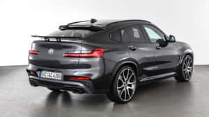 Stunning Bmw X4 In A Natural Landscape Wallpaper