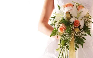 Stunning Bridal Bouquet At A Wedding Ceremony Wallpaper