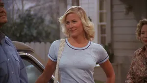 Stunning Brittany Daniel Posing In A White Dress Wallpaper