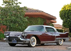 Stunning Cadillac Eldorado In Classic Red Wallpaper