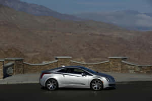 Stunning Cadillac Elr Electric Luxury Coupe On The Road Wallpaper