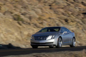 Stunning Cadillac Elr Electric Luxury Coupe On The Road Wallpaper