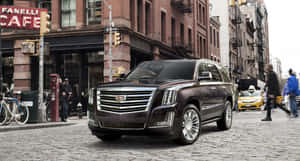 Stunning Cadillac Escalade On Urban Landscape Wallpaper