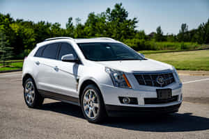 Stunning Cadillac Srx On The Road Wallpaper