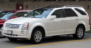 Stunning Cadillac Srx On The Road Wallpaper