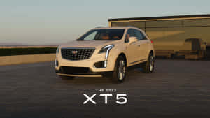 Stunning Cadillac Xt5 On The Road Wallpaper