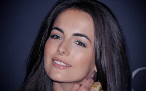 Stunning Camilla Belle In A White Dress Wallpaper