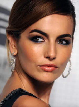 Stunning Camilla Belle In Elegant Attire Wallpaper