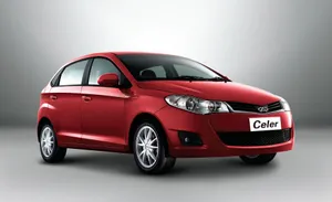 Stunning Chery Car On A Scenic Route Wallpaper