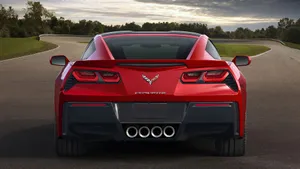 Stunning Chevrolet Corvette C7 In Motion Wallpaper