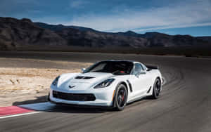 Stunning Chevrolet Corvette Z06 In Action Wallpaper