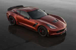 Stunning Chevrolet Corvette Z06 In Action On An Open Road Wallpaper