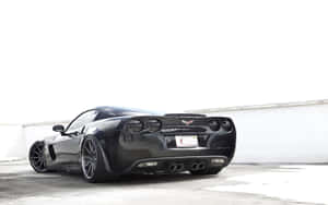 Stunning Chevrolet Corvette Z06 In Action Wallpaper