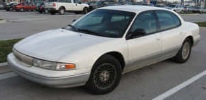 Stunning Chrysler Lhs Sedan On The Road Wallpaper