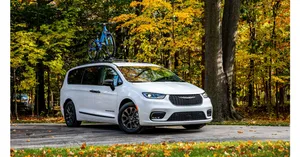 Stunning Chrysler Pacifica On A Scenic Road Wallpaper