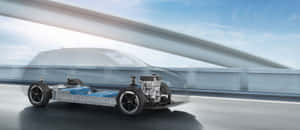 Stunning Electric Vehicle On The Road Wallpaper