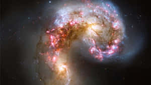 Stunning Elliptical Galaxy In Deep Space Wallpaper