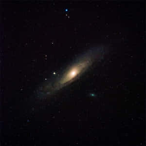 Stunning Elliptical Galaxy In Deep Space Wallpaper
