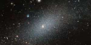 Stunning Elliptical Galaxy In Deep Space Wallpaper