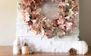 Stunning Fall Wreath On A Rustic Wooden Door Wallpaper