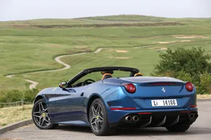 Stunning Ferrari California T On Scenic Drive Wallpaper