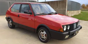 Stunning Fiat Ritmo On A Scenic Road Wallpaper