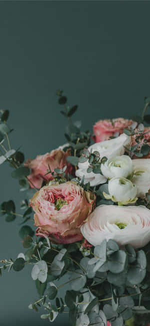 Stunning Floral Arrangement With Diverse Mix Of Fresh Flowers Wallpaper