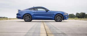 Stunning Ford Mustang California Special Cruising Down The Road Wallpaper