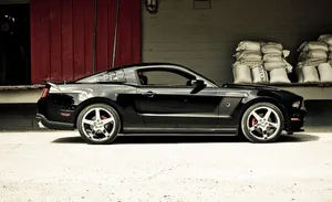 Stunning Ford Mustang Roush Roaring Down The Street Wallpaper
