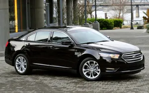 Stunning Ford Taurus On Open Road Wallpaper