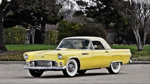 Stunning Ford Thunderbird Cruising Down The Highway Wallpaper
