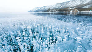 Stunning Frozen Lake In Winter Wallpaper