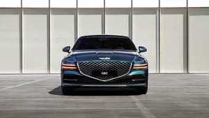 Stunning Genesis G80 Sedan In A Majestic Setting Wallpaper