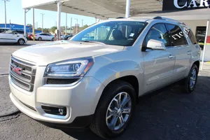 Stunning Gmc Acadia Cruising On The Highway Wallpaper