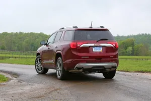 Stunning Gmc Acadia In A Picturesque Setting Wallpaper