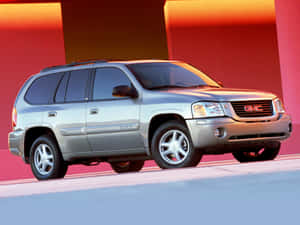 Stunning Gmc Envoy On The Road Wallpaper